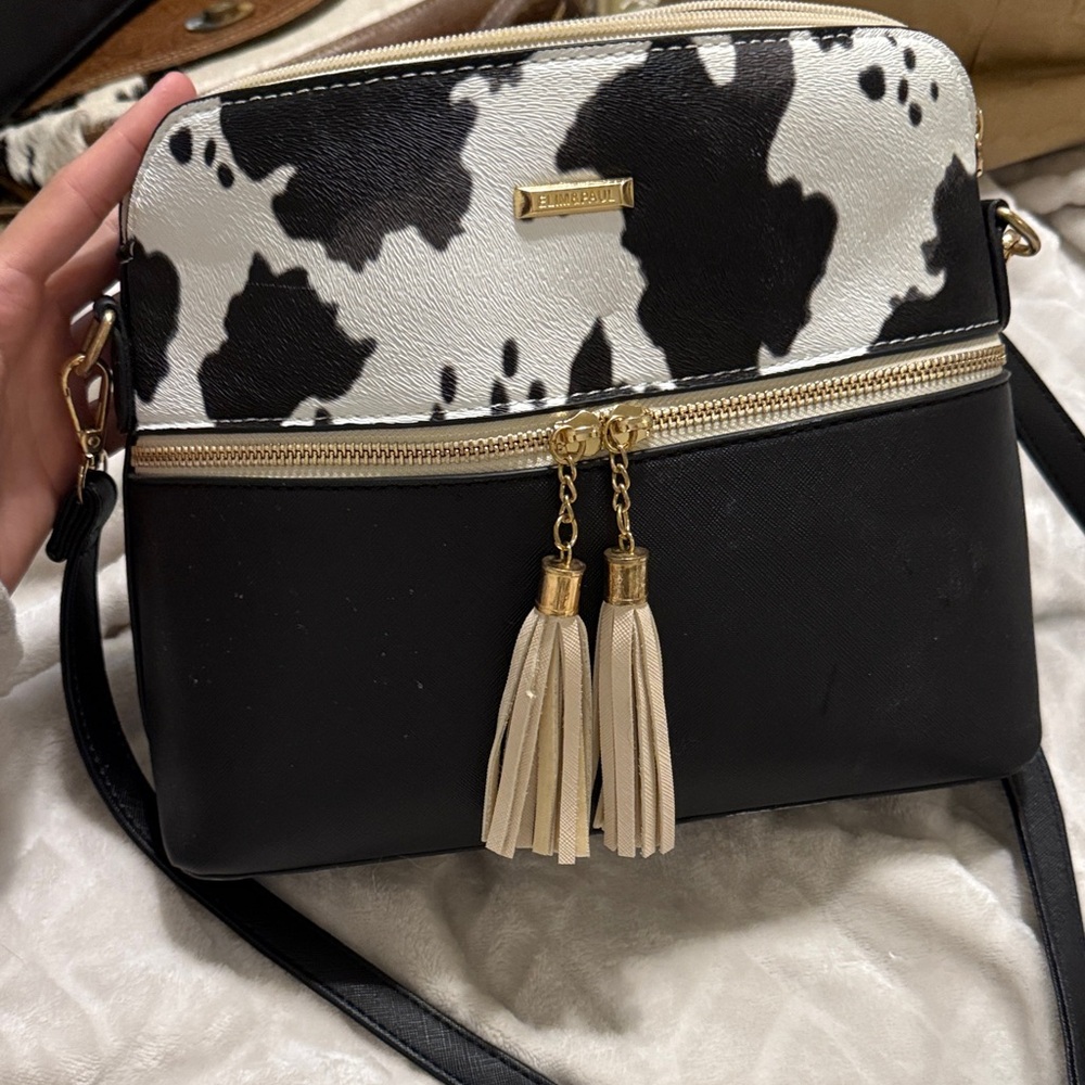 Elegant Black and White Crossbody Bag with Gold Accents